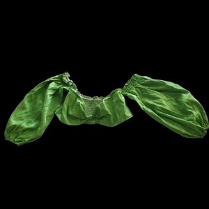 Green crop top with connected sleeves, bow tie front. Size L